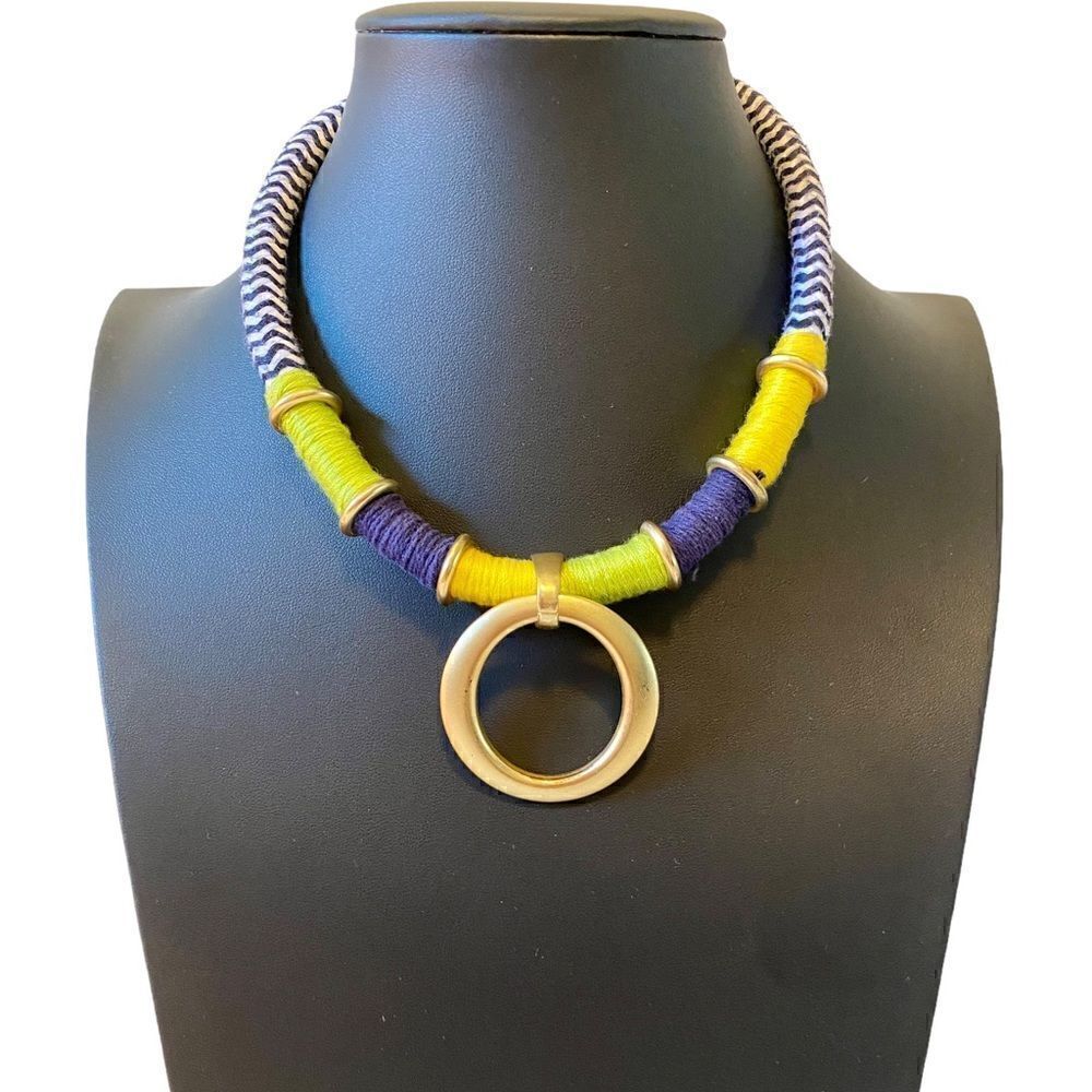 Multi Colored Thread Necklace w/ Matte Gold Toned circle Pendant.
